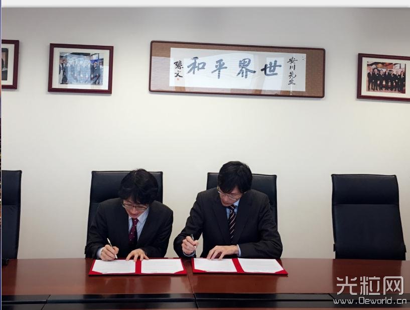 恩耐激光技术（上海）有限公司总经理陈峻弘先生（右）与安川电机(中国)有限公司机器人事业部西川清吾先生（左）签署战略备忘录1